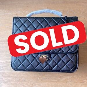 quilted crossbody/ backpack